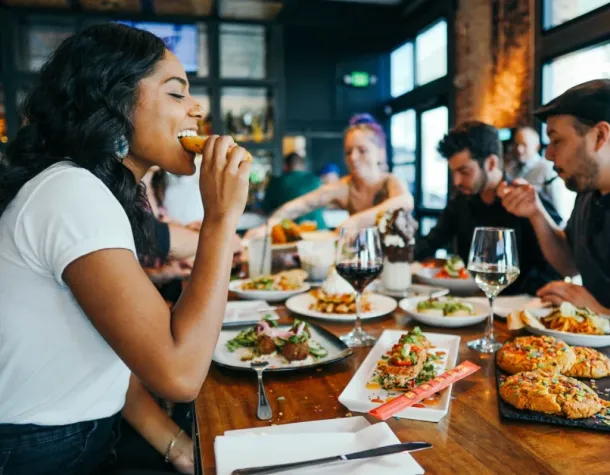 woman eats in a restaurant