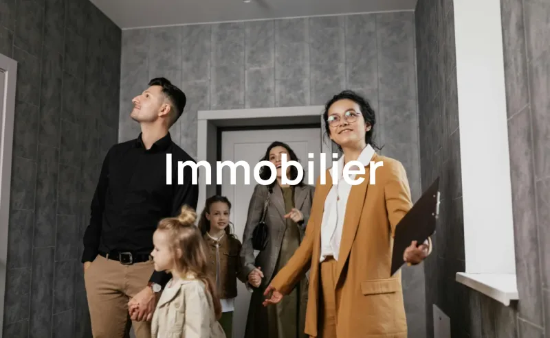 real estate agent shows a family a house